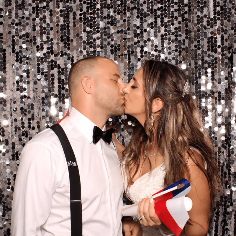 Bride and Groom taking photo with Platinum Photo Booth at the Coral Gables Country Club